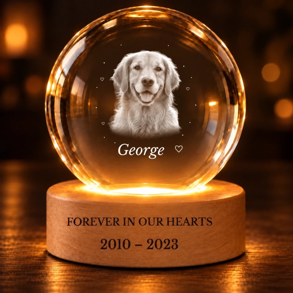 Personalized pet memorial crystal ball illuminated in warm evening light