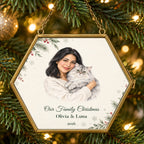 Personalized Hexagon family and pet watercolor brass ornament hanging on a Christmas tree