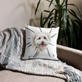 Dog lover holding a personalized pet face pillow on couch