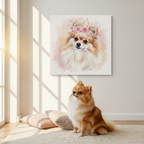 Female Pomeranian sitting below her watercolor portrait canvas with floral crown